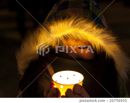 A girl with a candle 20756935