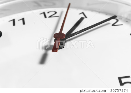 Closeup of hands on clock face.sensitive focus Closeup of hands on clock face.sensitive focus 20757374