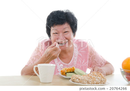 asian senior female dining 20764266