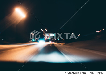 Blurred car lights in the nighttime. 20767997