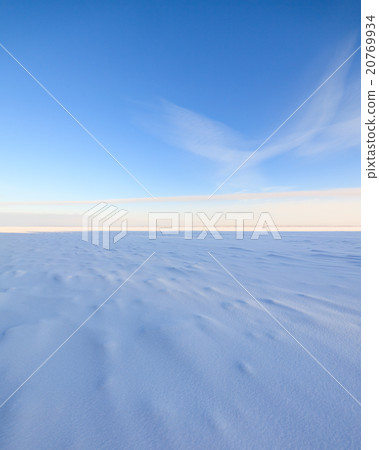Frozen lake scape and blue sky 20769934