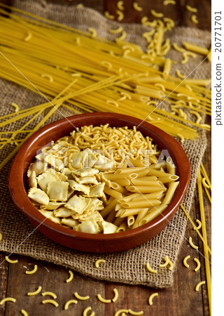 uncooked pasta: ravioli, spaghetti or mostaccioli 20771701