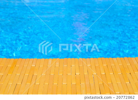 Swimming pool and wooden deck for backgrounds Swimming pool and wooden deck for backgrounds 20772862