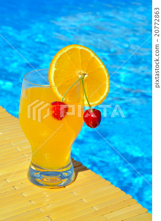 Cocktail glass with orange and cherry Cocktail glass with orange and cherry 20772863