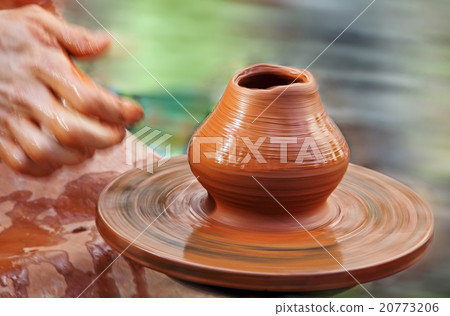 Spinning pottery wheel taken closeup.Soft bokeh. Spinning pottery wheel taken closeup.Soft bokeh. 20773206