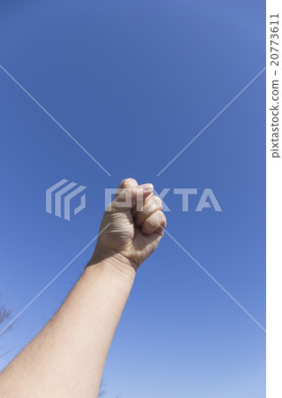 Thrust up the fist (blue sky) Thrust up the fist (blue sky) 20773611