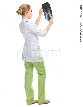 Young doctor with X-ray 20775006