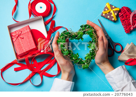 female hands holding a gift 20776043