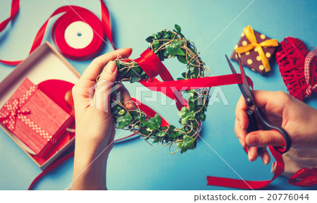 Female hands are holding gift 20776044