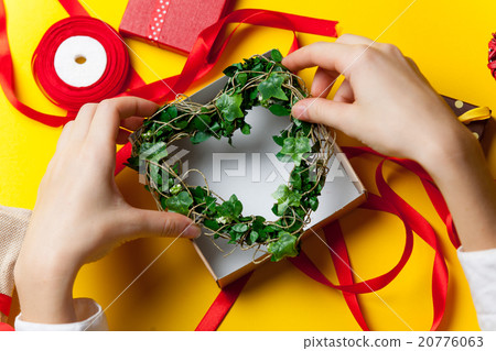 Female hands are holding a gift 20776063