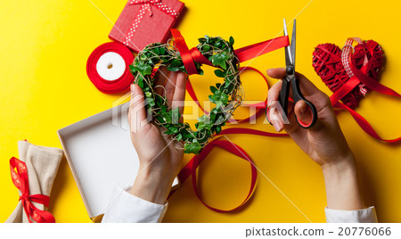 Female hands are holding a gift 20776066