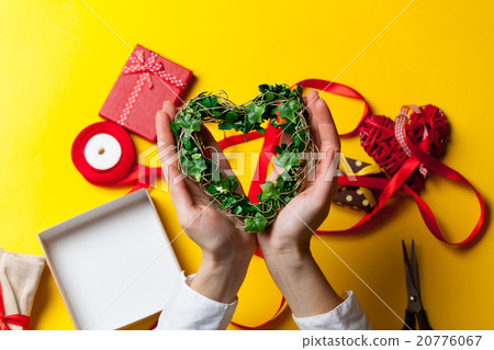 Female hands are holding a gift 20776067