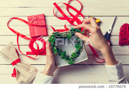 Female hands are holding gift 20776070