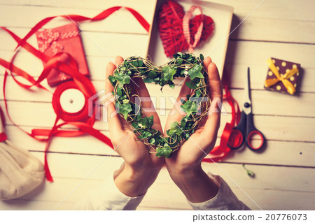 Female hands are holding gift 20776073