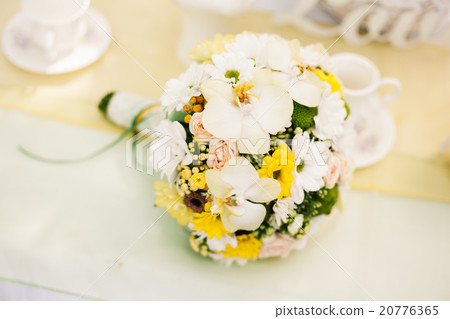 White orchids and yellow roses bride bouquet  20776365