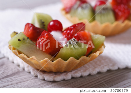 tartlets with strawberries, kiwi and cranberries tartlets with strawberries, kiwi and cranberries 20780579
