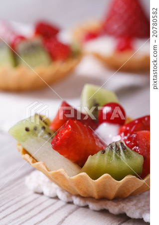tartlets with strawberries, kiwi and cranberries tartlets with strawberries, kiwi and cranberries 20780582