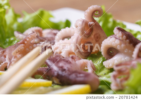 octopus with lettuce and chopsticks macro octopus with lettuce and chopsticks macro 20781424