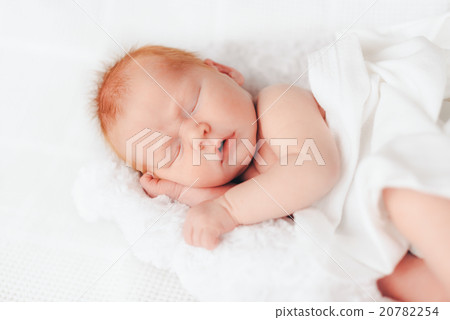 sleeping newborn baby in a wrap sleeping newborn baby in a wrap 20782254