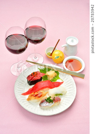 Image of sushi and red wine. 20783942