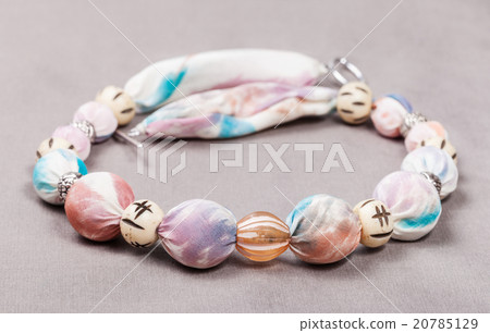 textile necklace from pink silk batik on gray 20785129