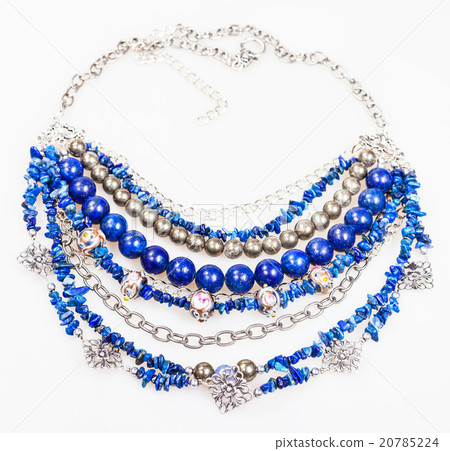 blue necklace from natural gemstones on white 20785224