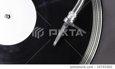 Dj needle stylus on spinning record Dj needle stylus on spinning record 20785860