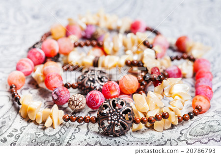 tangled necklace from natural gemstones close up 20786793