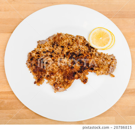 fried veal schnitzel on white plate fried veal schnitzel on white plate 20786815