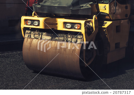 Fragment of yellow roller, road under construction 20787317