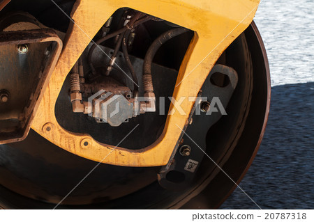 Fragment of yellow roller wheel, urban road 20787318