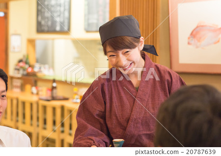 A woman working in a pub in a pub 20787639