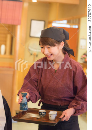 A woman working in a pub in a pub 20787640