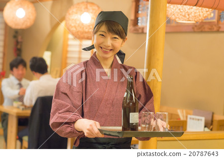 A woman working in a pub in a pub 20787643