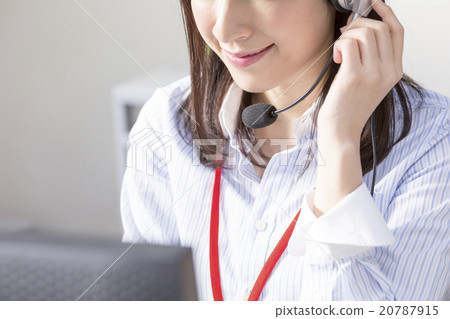 A woman working at a call center 20787915