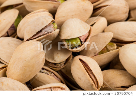 Pistachio nuts arranges as background Pistachio nuts arranges as background 20790704
