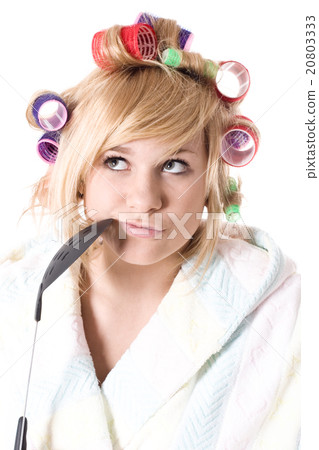 funny housewife with curlers 20803333