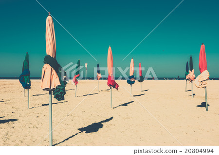 The famous colorful parasols on Deauville beach 20804994