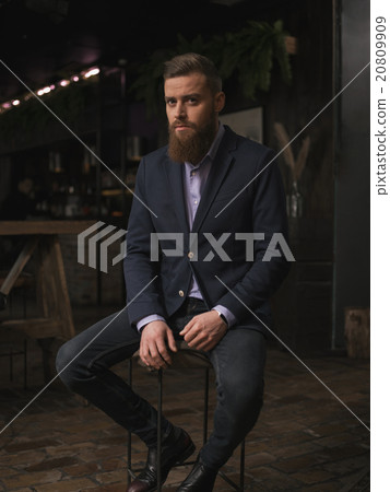 Handsome bearded man is resting in bar Handsome bearded man is resting in bar 20809909