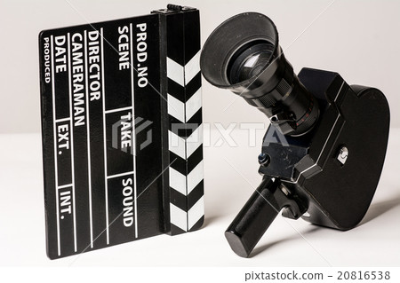Old movie camera with film clapperboard. Old movie camera with film clapperboard. 20816538