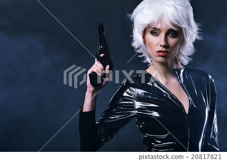 beautiful sexy girl holding gun . smoke background 20817821