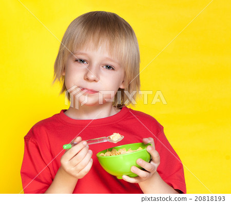 Blond boy kid child eating corn flakes cereal 20818193