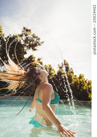 Beautiful blonde heading out of water 20819482