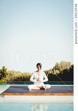 Calm brunette doing yoga Calm brunette doing yoga 20819546