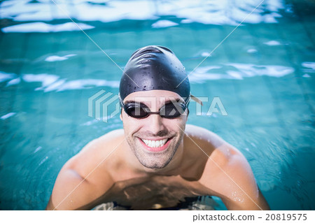 Man wearing swimming goggles 20819575
