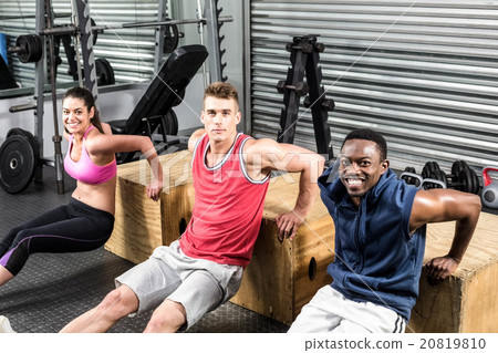 Fit people exercising together 20819810