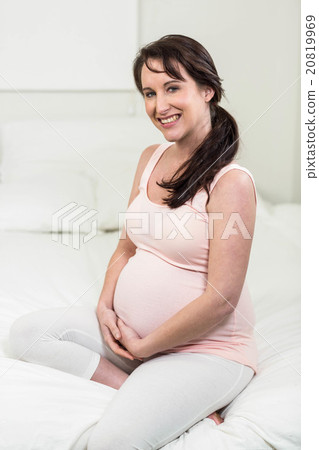 Portrait of smiling pregnant woman Portrait of smiling pregnant woman 20819969