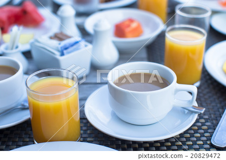 Delicious tasty cappuccino and fresh juice for Delicious tasty cappuccino and fresh juice for 20829472