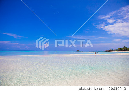 Idyllic tropical beach with white sand and perfect Idyllic tropical beach with white sand and perfect 20830640