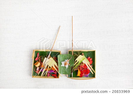 Traditional balinese offering on light background Traditional balinese offering on light background 20833969